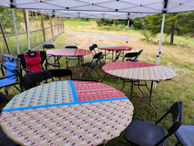 Tables under pavilions